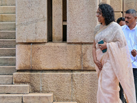 Sri Lankan Prime Minister Harini Amarasuriya walks to take a photograph with the newly appointed cabinet ministers at the president's office...