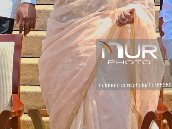 Sri Lankan Prime Minister Harini Amarasuriya gestures to the supporters with the newly appointed cabinet ministers at the president's office...