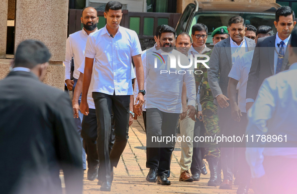 Sri Lankan President Anura Kumara Dissanayake arrives to take a photograph with newly appointed cabinet ministers at the president's office...