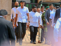 Sri Lankan President Anura Kumara Dissanayake arrives to take a photograph with newly appointed cabinet ministers at the president's office...