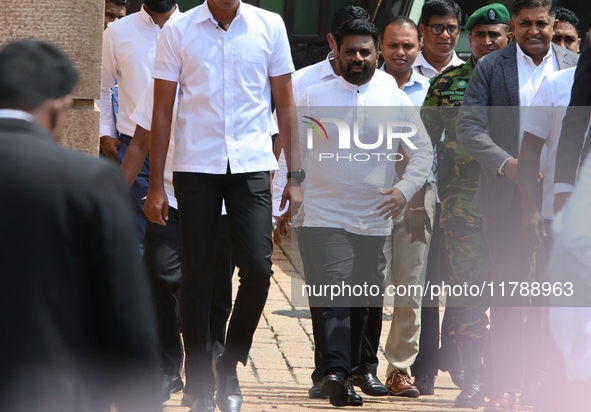 Sri Lankan President Anura Kumara Dissanayake arrives to take a photograph with newly appointed cabinet ministers at the president's office...