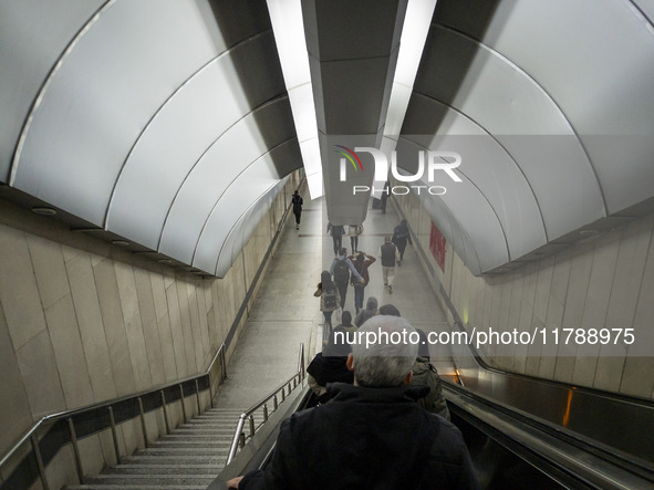 Iranian people are at an urban railway station in western Tehran, Iran, on November 17, 2024. 