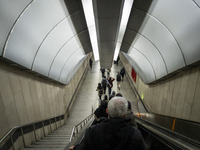 Iranian people are at an urban railway station in western Tehran, Iran, on November 17, 2024. (