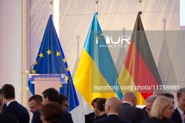 A general view of the flags of Europe, Ukraine, and Germany is seen before the Ukraine Conference of NRW at Flora Hall in Cologne, Germany,...