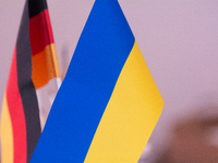 A general view of the flags of Ukraine and Germany is seen before the Ukraine Conference of NRW at Flora Hall in Cologne, Germany, on Novemb...