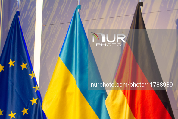 A general view of the flags of Europe, Ukraine, and Germany is seen before the Ukraine Conference of NRW at Flora Hall in Cologne, Germany,...