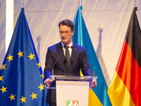 Hendrik Wust, NRW state minister president, speaks during the opening of the Ukraine Conference of NRW at Flora Hall in Cologne, Germany, on...