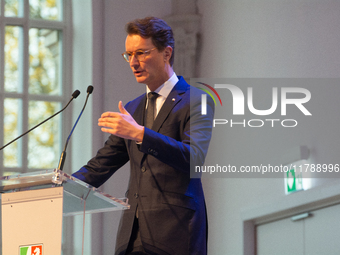 Hendrik Wust, NRW state minister president, speaks during the opening of the Ukraine Conference of NRW at Flora Hall in Cologne, Germany, on...