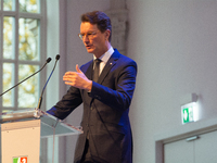 Hendrik Wust, NRW state minister president, speaks during the opening of the Ukraine Conference of NRW at Flora Hall in Cologne, Germany, on...