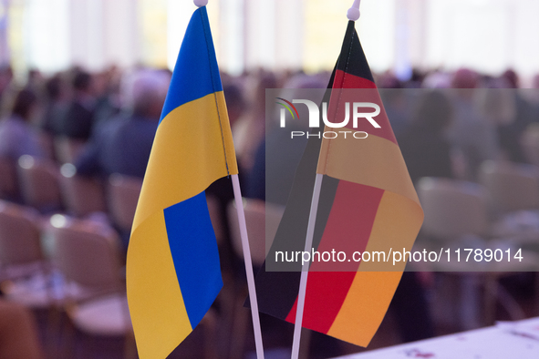 A general view of the flags of Ukraine and Germany is seen before the Ukraine Conference of NRW at Flora Hall in Cologne, Germany, on Novemb...