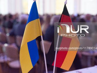 A general view of the flags of Ukraine and Germany is seen before the Ukraine Conference of NRW at Flora Hall in Cologne, Germany, on Novemb...