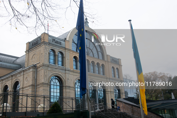 A general view of the flags of Europe and Ukraine is seen during the opening of the Ukraine Conference of NRW at Flora Hall in Cologne, Germ...