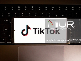 The TikTok logo displays on a smartphone screen in this photo illustration in Athens, Greece, on November 18, 2024. The Canadian government...