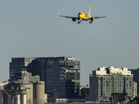 Spirit Airlines Airbus A320NEO aircraft spotted flying, landing and taxiing at LaGuardia airport. The iconic yellow A320 neo passenger airpl...