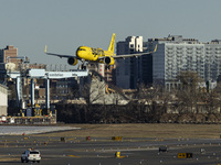 Spirit Airlines Airbus A320NEO aircraft spotted flying, landing and taxiing at LaGuardia airport. The iconic yellow A320 neo passenger airpl...