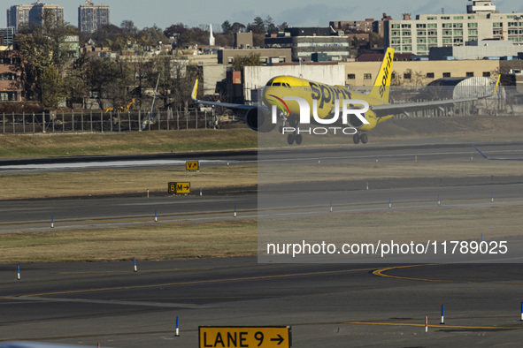 Spirit Airlines Airbus A320NEO aircraft spotted flying, landing and taxiing at LaGuardia airport. The iconic yellow A320 neo passenger airpl...