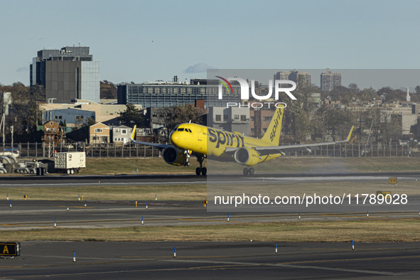 Spirit Airlines Airbus A320NEO aircraft spotted flying, landing and taxiing at LaGuardia airport. The iconic yellow A320 neo passenger airpl...