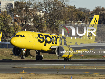 Spirit Airlines Airbus A320NEO aircraft spotted flying, landing and taxiing at LaGuardia airport. The iconic yellow A320 neo passenger airpl...