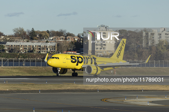 Spirit Airlines Airbus A320NEO aircraft spotted flying, landing and taxiing at LaGuardia airport. The iconic yellow A320 neo passenger airpl...