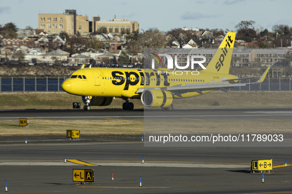 Spirit Airlines Airbus A320NEO aircraft spotted flying, landing and taxiing at LaGuardia airport. The iconic yellow A320 neo passenger airpl...