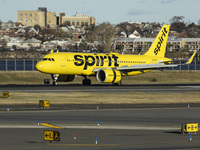 Spirit Airlines Airbus A320NEO aircraft spotted flying, landing and taxiing at LaGuardia airport. The iconic yellow A320 neo passenger airpl...