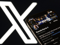 An editorial image shows an iPhone screen displaying Kamala Harris' personal account on the X social network platform. The X logo appears su...