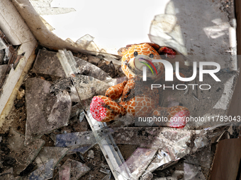 A soft toy lies among glass shards on the windowsill in a house damaged by a large-scale Russian missile strike in the Odesa region, Ukraine...