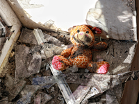 A soft toy lies among glass shards on the windowsill in a house damaged by a large-scale Russian missile strike in the Odesa region, Ukraine...