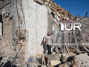 In the Odesa region, Ukraine, on November 17, 2024, a woman walks along a house destroyed by a large-scale Russian missile strike. In the re...