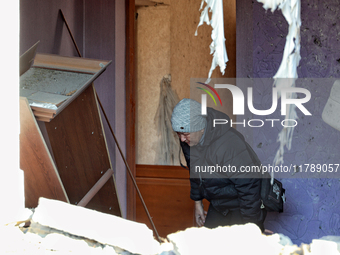 A woman is in a room of a house damaged by a large-scale Russian missile strike in Odesa region, Ukraine, on November 17, 2024. In the recen...