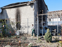 In the Odesa region, Ukraine, on November 17, 2024, a man walks along a house damaged by a large-scale Russian missile strike. In the recent...