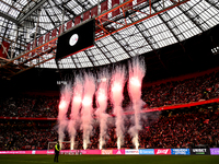 Fireworks occur at the start of the match during the Ajax Legends - Real Madrid Legends game at the Johan Cruijff ArenA for the Dutch Erediv...