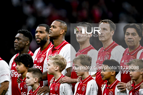 AFC Ajax Amsterdam legend players Michel Kreek, Cristian Chivu, Patrick Kluivert, and Ryan Babel participate in the match between Ajax Legen...