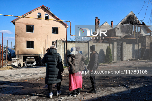 In the Odesa region, Ukraine, on November 17, 2024, people look at a house damaged by a large-scale Russian missile strike. In the recent ma...