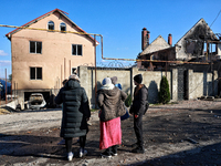 In the Odesa region, Ukraine, on November 17, 2024, people look at a house damaged by a large-scale Russian missile strike. In the recent ma...