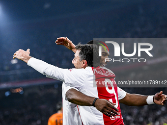 Supporters of AFC Ajax Amsterdam and AFC Ajax Amsterdam legend player Ryan Babel celebrate the goal during the match between Ajax Legends an...