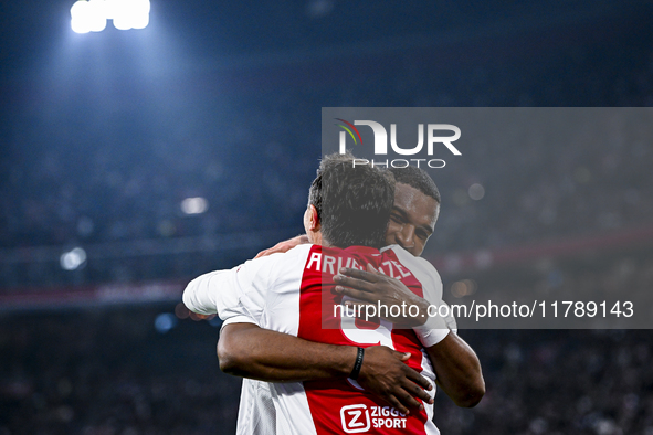 Supporters of AFC Ajax Amsterdam and AFC Ajax Amsterdam legend player Ryan Babel celebrate the goal during the match between Ajax Legends an...