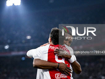 Supporters of AFC Ajax Amsterdam and AFC Ajax Amsterdam legend player Ryan Babel celebrate the goal during the match between Ajax Legends an...