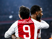 Supporters of AFC Ajax Amsterdam and AFC Ajax Amsterdam legend player Ryan Babel celebrate the goal during the match between Ajax Legends an...