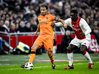 Real Madrid CF legend Luis Milla and AFC Ajax Amsterdam legend Clarence Seedorf participate in the match between Ajax Legends and Real Madri...