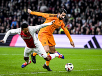 AFC Ajax Amsterdam legend Urby Emanuelson and Real Madrid CF legend Ruben de la Red participate in the match between Ajax Legends and Real M...