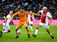 Real Madrid CF legend player Ruben de la Red and AFC Ajax Amsterdam legend player Dick Schoenaker participate in the match between Ajax Lege...