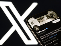 An editorial image shows an iPhone screen with Taylor Swift's personal account displayed on the X social network platform. The X logo appear...