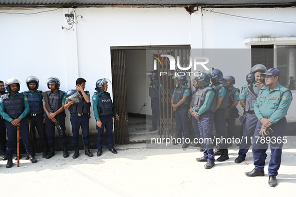 Police personnel stand guard in front of Bangladesh's International Crimes Tribunal (ICT) court in Dhaka, Bangladesh, on November 18, 2024....