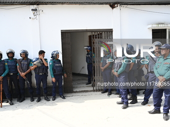 Police personnel stand guard in front of Bangladesh's International Crimes Tribunal (ICT) court in Dhaka, Bangladesh, on November 18, 2024....