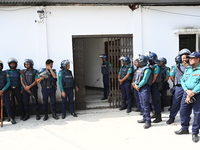 Police personnel stand guard in front of Bangladesh's International Crimes Tribunal (ICT) court in Dhaka, Bangladesh, on November 18, 2024....