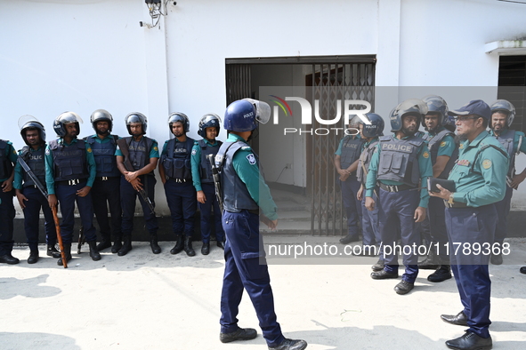 Police personnel stand guard in front of Bangladesh's International Crimes Tribunal (ICT) court in Dhaka, Bangladesh, on November 18, 2024....