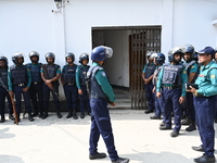 Police personnel stand guard in front of Bangladesh's International Crimes Tribunal (ICT) court in Dhaka, Bangladesh, on November 18, 2024....