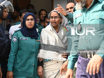 Police personnel escort detainee Dr. Dipu Moni, former Minister and a member of Bangladesh's ousted former Prime Minister Sheikh Hasina's Aw...