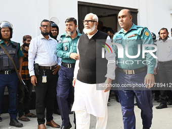 Police personnel escort detainee Salman F. Rahman, adviser to former Prime Minister Sheikh Hasina, former Minister, and a member of Banglade...